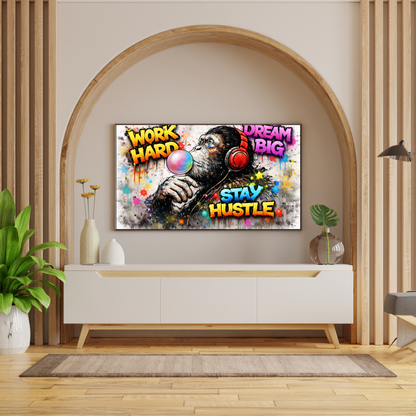 Decorative wall art with motivational phrases in a modern living room setting.