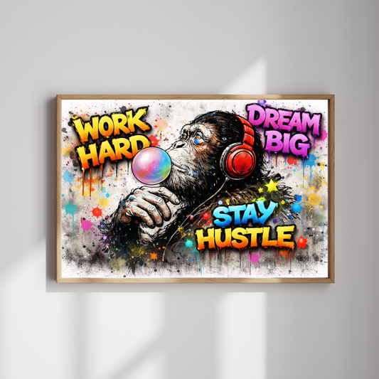 Framed artwork with a monkey wearing headphones, colorful text, and abstract design on a white wall.