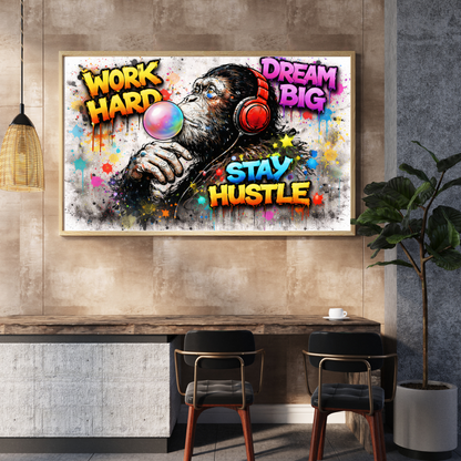 Motivational poster with a monkey wearing headphones on a wall above a desk.