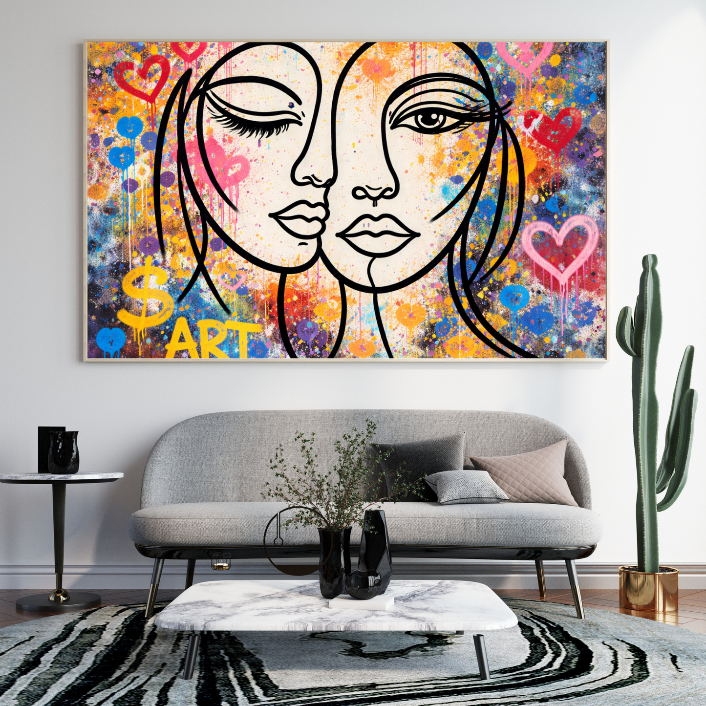 Colorful abstract painting of two faces above a gray sofa in a living room.